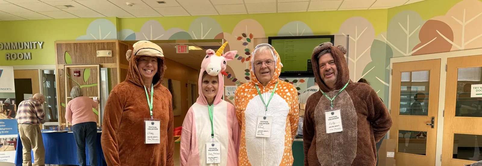 Festival volunteers in animal costumes joining the All Species Parade